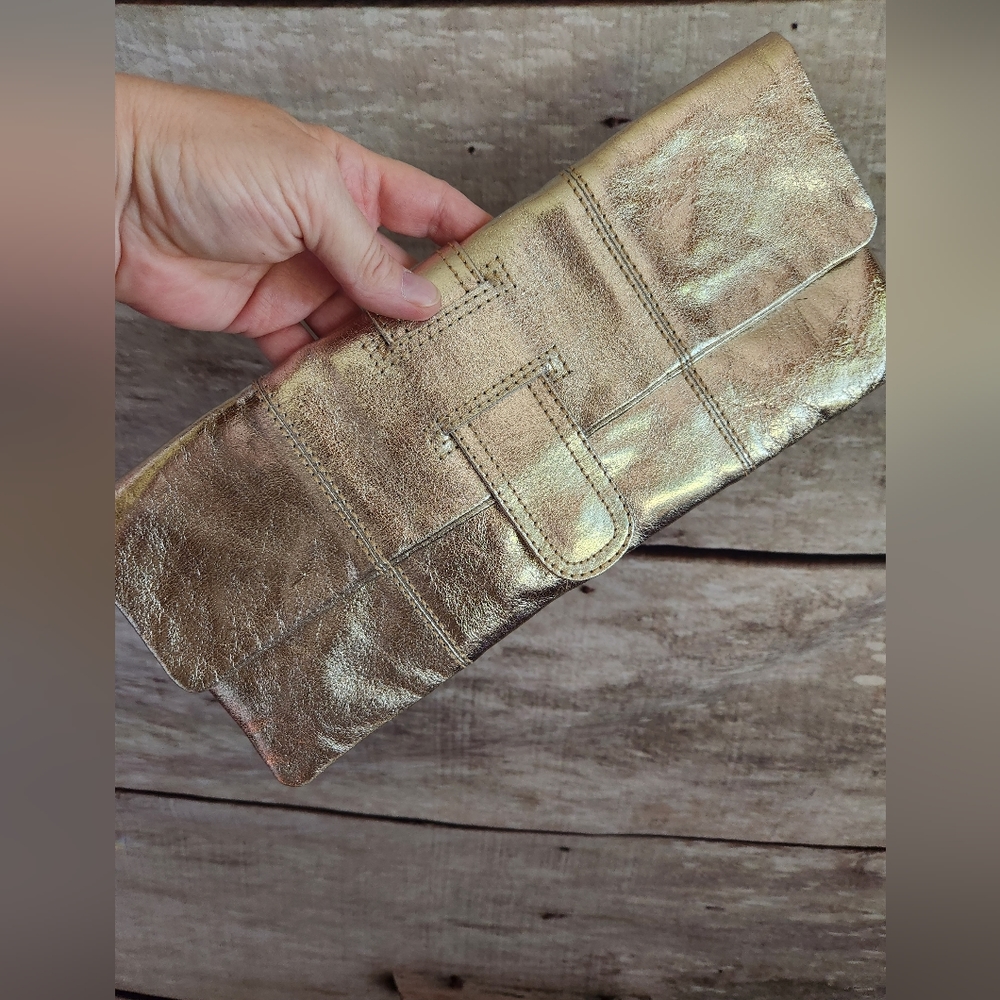 Gold leather clutch